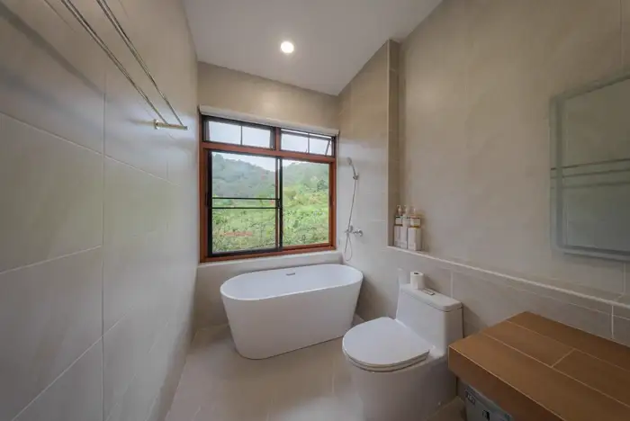 Indoor bathroom with mountain-view bathtub