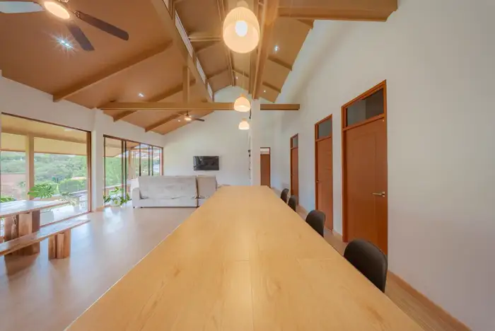 Open kitchen with round mountain-view window