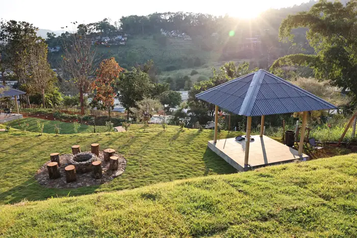 Fire pit lawn and outdoor sala in the evening
